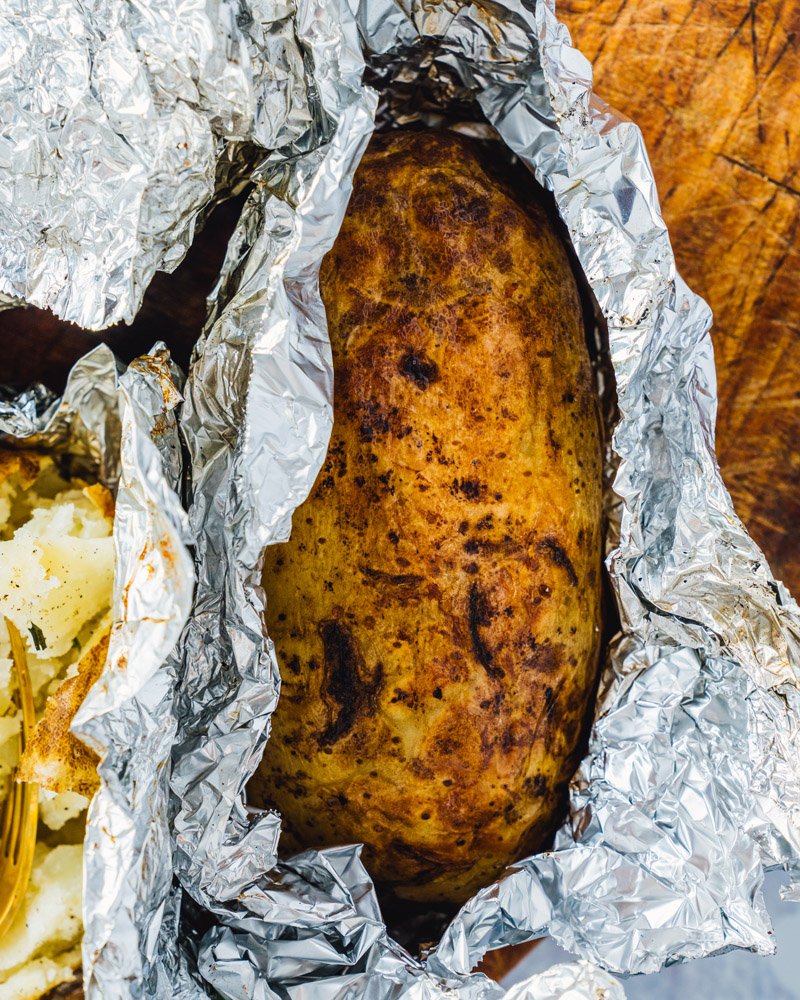 Baked potato on the grill
