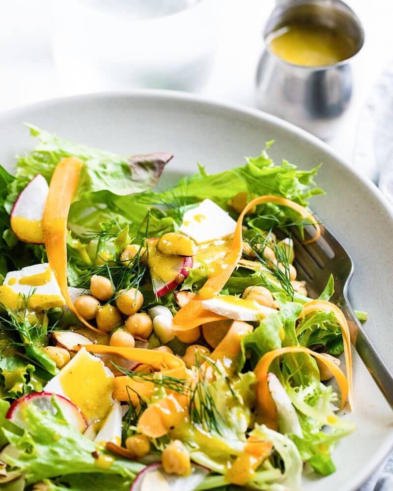 Californian Salad with Avocado Oil Dressing |  A couple is cooking