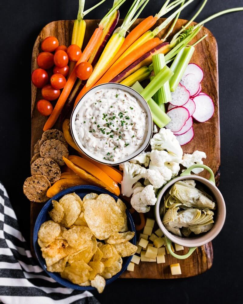 Happy hour platter with caramelized onion dip |  A couple of cooks over trays and boards