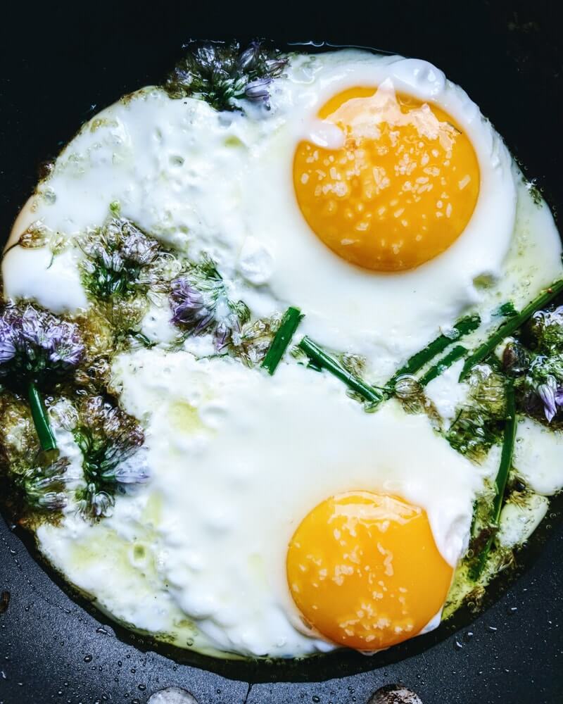 Eggs with chive flowers
