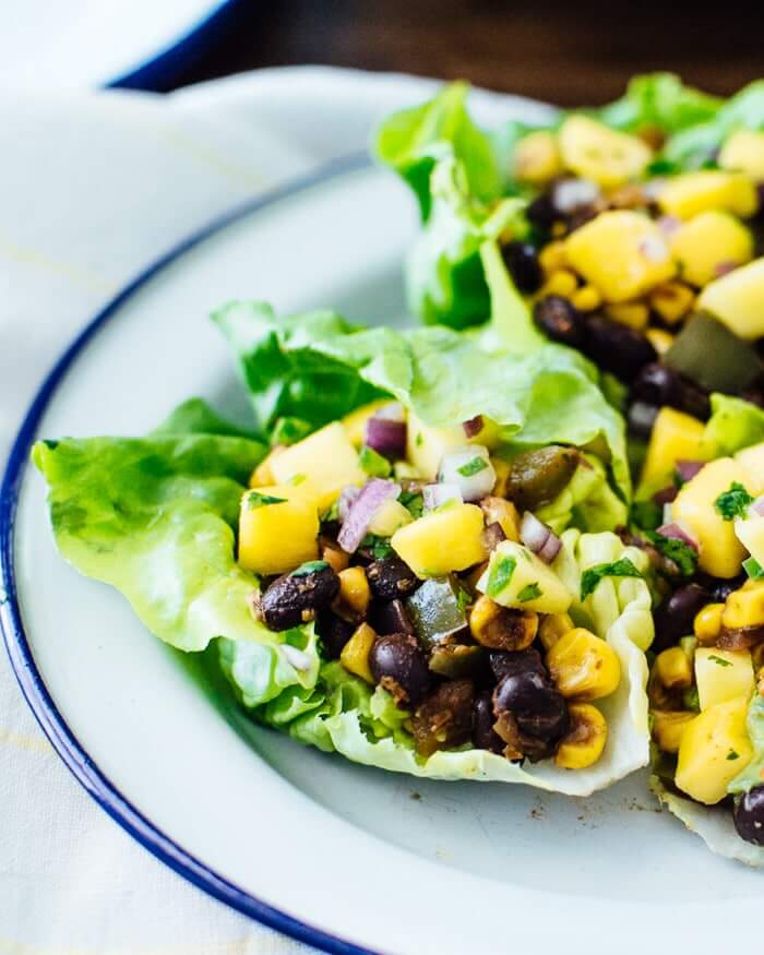 Veggie Salad Wraps |  Vegan lettuce wraps filled with black chipotle beans