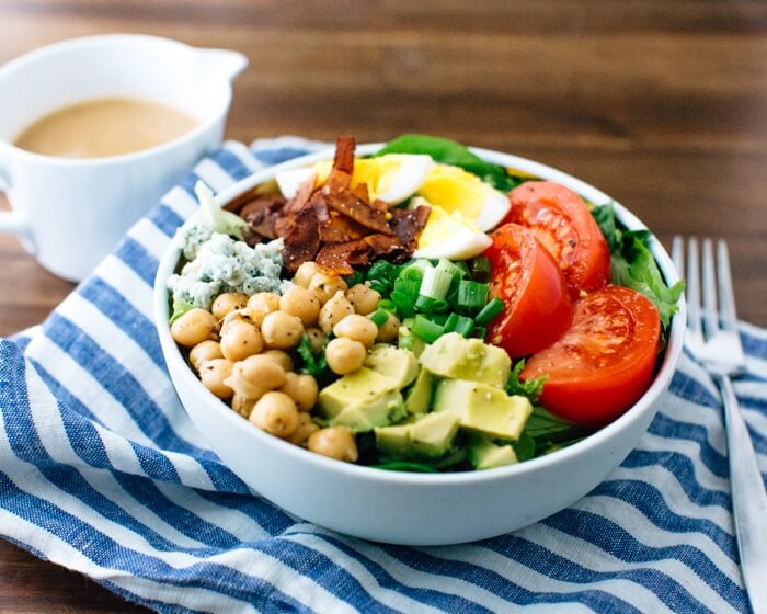 Vegetarian Cobb Salad |  A couple is cooking