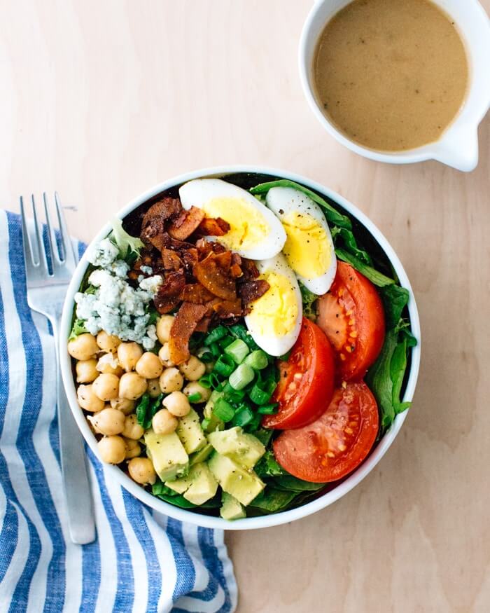 Vegetarian Cobb Salad |  A couple is cooking