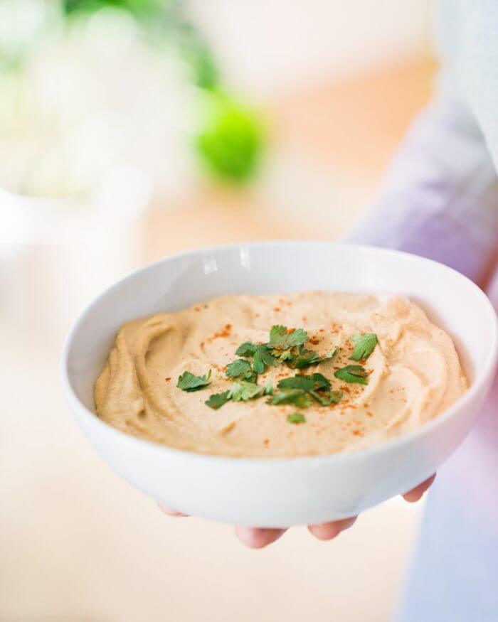 Ginger Lime Hummus |  A couple is cooking