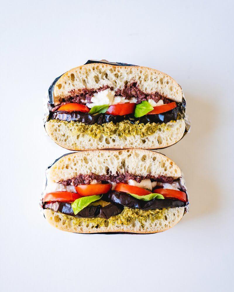 Tomato Eggplant Sandwich |  A couple is cooking