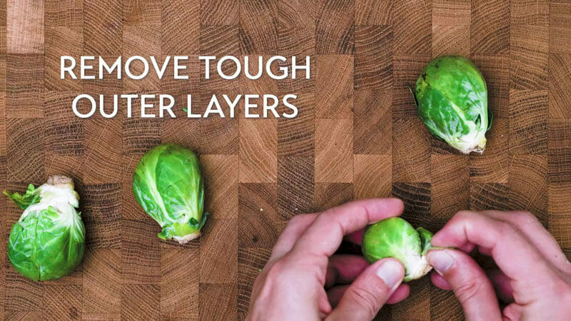How to grate Brussels sprouts: Remove tough layers