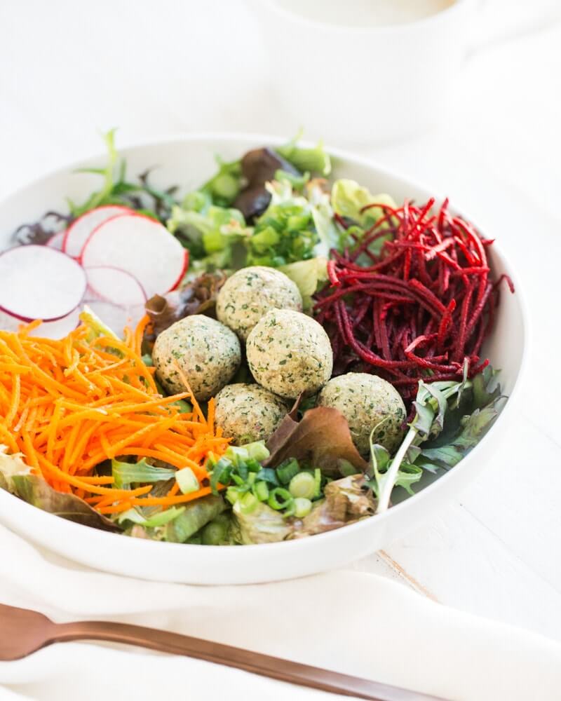 Raw Falafel Buddha Bowls |  A couple is cooking