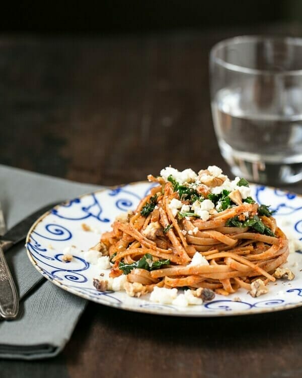 Red pepper pesto linguine with kale and feta