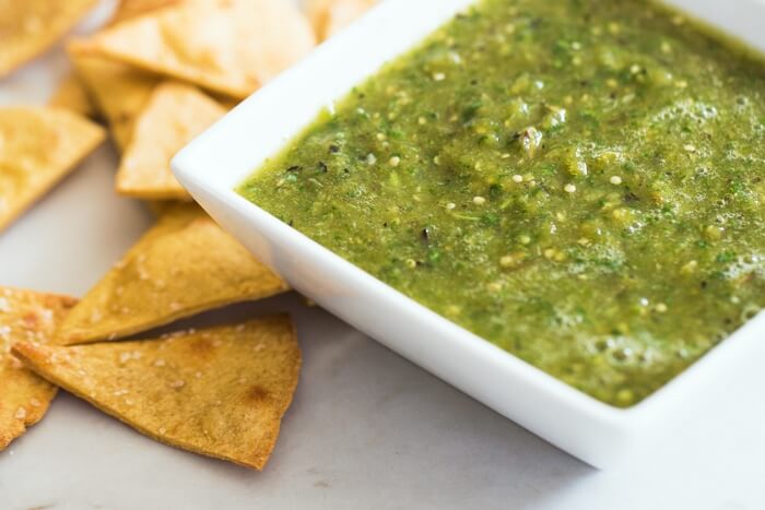 Roasted Tomato Salsa (Salsa Verde) |  A couple is cooking