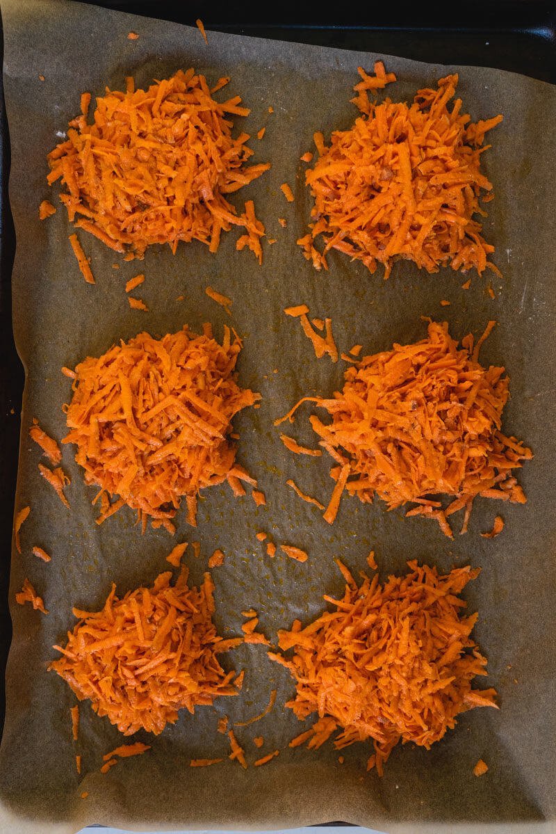 raw sweet potato rosti on a baking sheet
