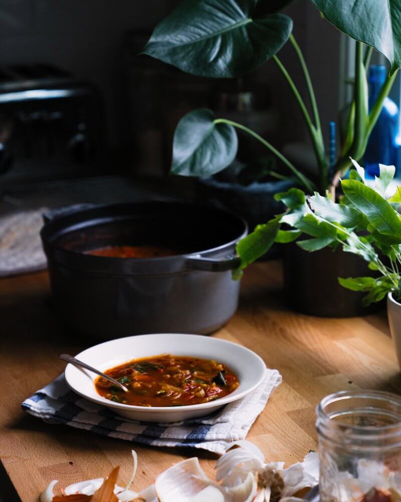 Chickpea Soup with Tomato and Sage |  A couple is cooking