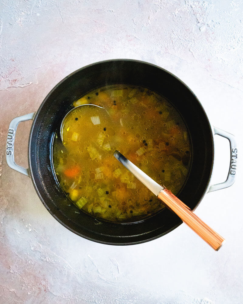 Homemade Vegetable Broth |  vegetable broth in a saucepan